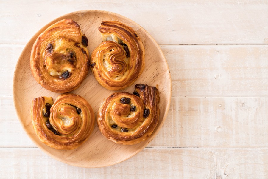 Quelle est l'origine du pain aux raisins ?